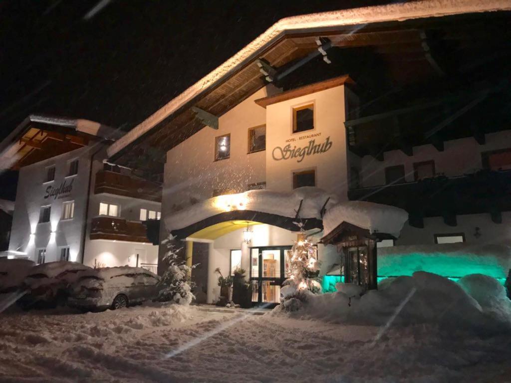 Sieglhub Chalets - Appartements - Hotel Флахау Екстер'єр фото